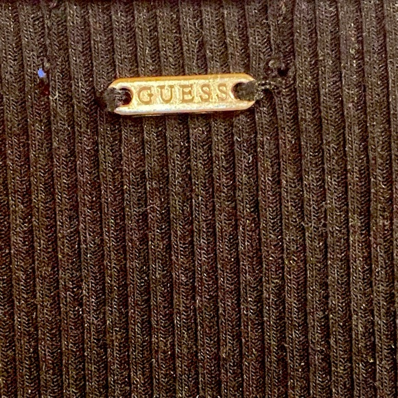 Black slightly below the knee dress by Guess with a silver chain style front. - Picture 4 of 5